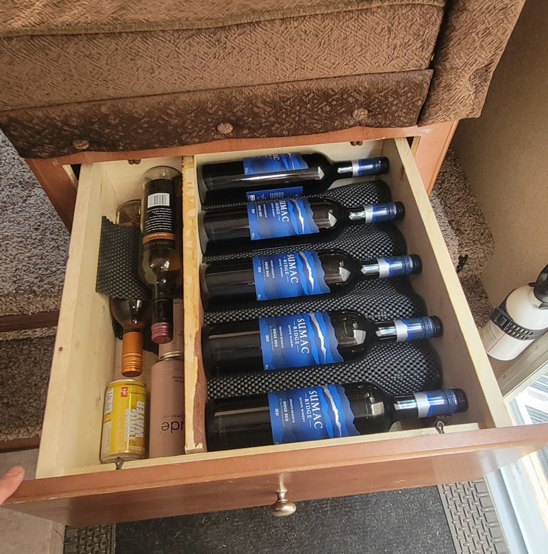Wine Cellar Storage Showing Wine Bottles In Drawer
