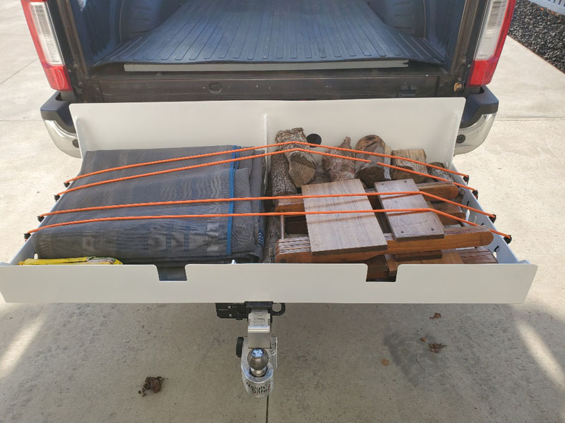 Camper Storage Tray With Firewood And Supplies