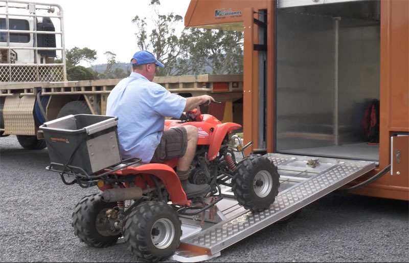 Front Garage With Quad Bike