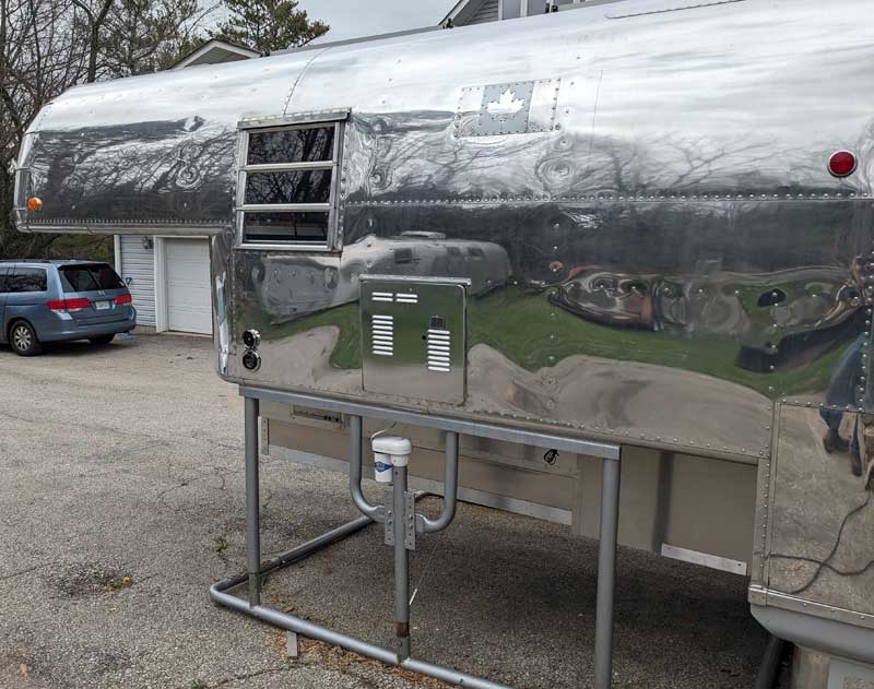 Canadian Flag Patch On Side Of Avion Camper