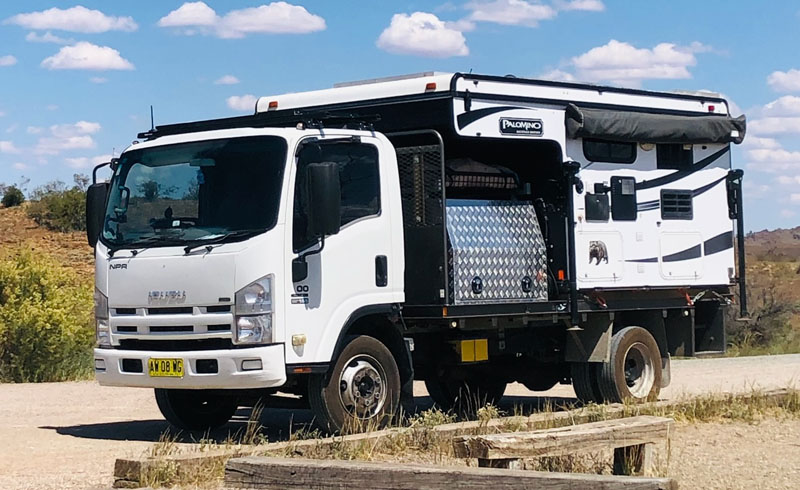 Palomino On Flatbed Isuzu NPR 400 Truck