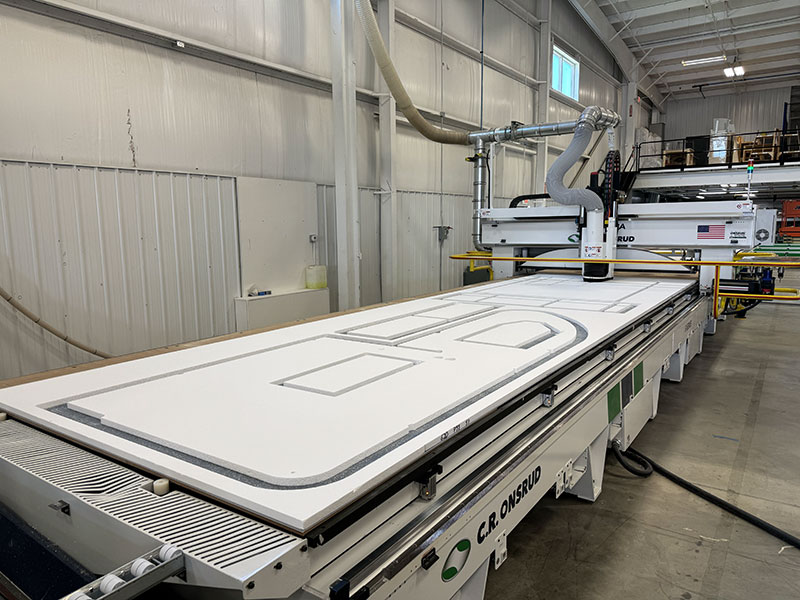 NuCamp Tech CNC Machine Wide Showing Camper Wall