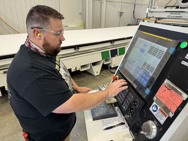 NuCamp Tech CNC Operator At Controls