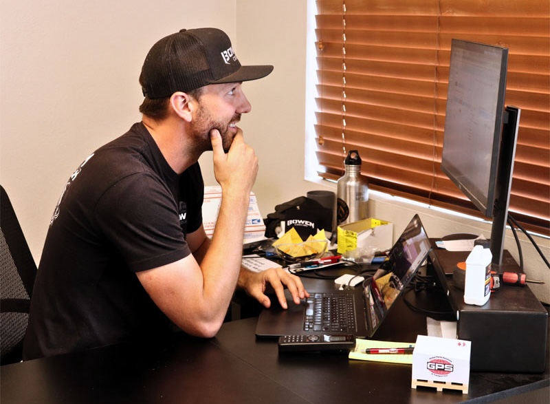 Bowen Customs Stu answering phones