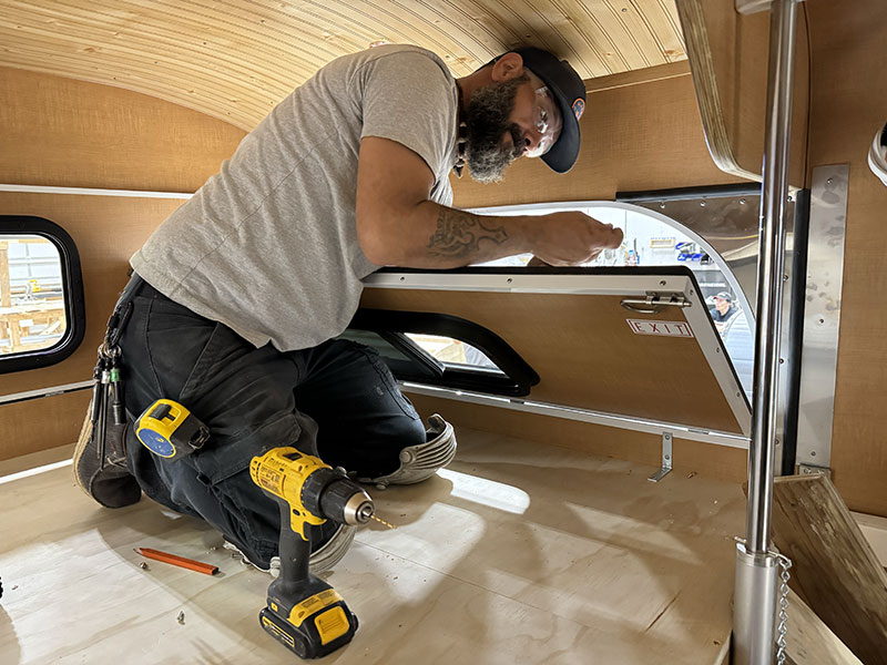 Alaskan Factory 2025 Working Inside Camper Cabover