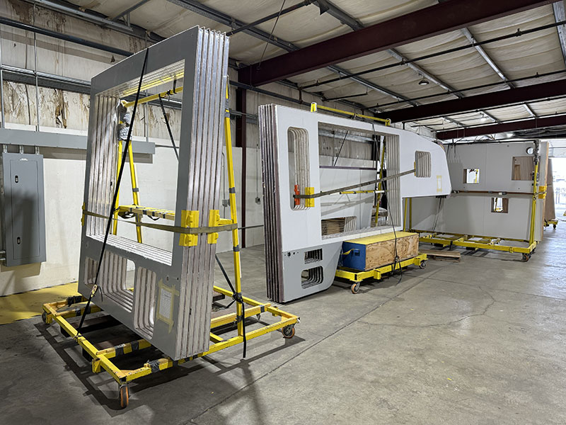 Eagle Cap truck camper walls ready for assembly on the production line