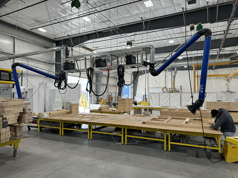 Adventurer truck campers using suspended Miller welders