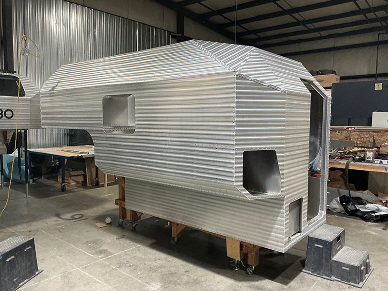 Kimbo 8 Exterior Rear Drivers side truck camper slide in