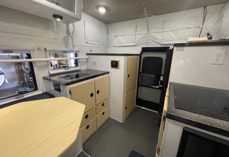 Hallmark Vail Interior Shot Of Drivers Side Cabinetry and bamboo doors