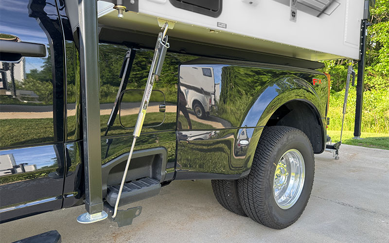 Camper Installed With Torklift Tie Downs And Turnbuckles
