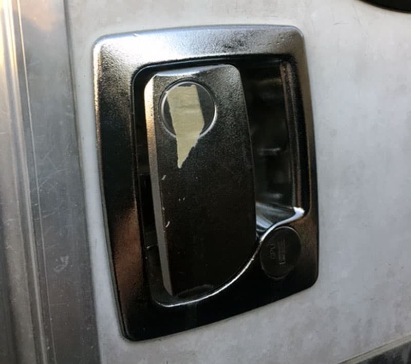 masking tape over the entry door lock key hole