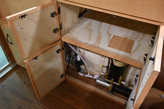 Alaskan-Camper-Review-INT-Kitchen-Inside-Cabinet