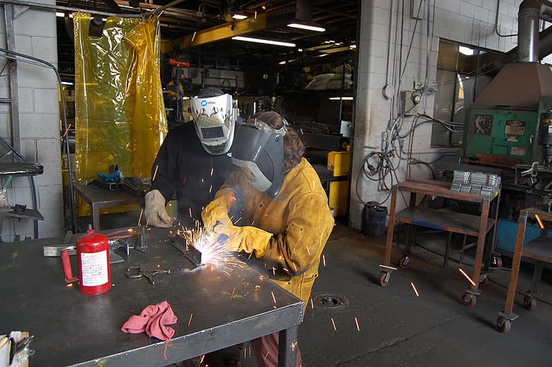 Angela welding at Torklift