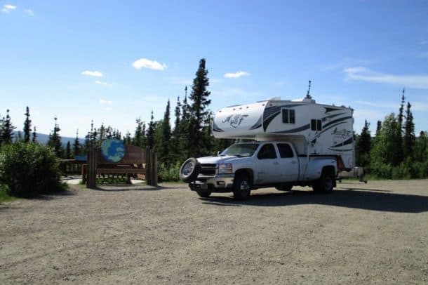 #140 - Roger WareingArctic Circle, Alaska2013 Chevrolet 35002016 Arctic Fox 990Camera Used - Nikon D3400We were on a trip to Alaska and wanted to go to the Arctic Circle.  The road was rough and the weather was cool but not freezing cold.  We were surprised at the amount of green instead of snow. We camped on the Yukon River about two hours below the Circle.