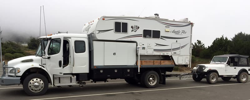 Arctic Fox Towing Jeep With Freighliner