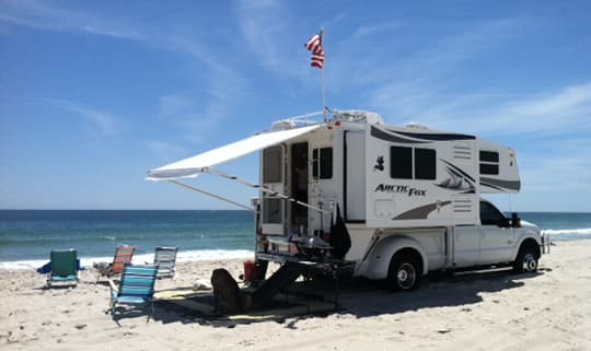 beach-camping-sand-camper