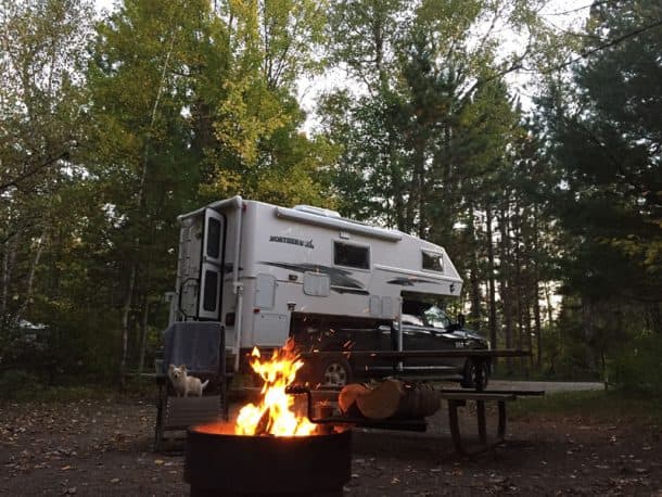 #222 - Doug JensenBear Head Lake State Park, Ely, Minnesota2017 Ram 35002017 Northern-Lite 10.2 EX CDSECamera Used - iPhone 7This shot was taken at Bear Head Lake State Park just outside of the Boundary Waters Canoe Area Wilderness of Northeastern Minnesota with my little travel buddy, Cody, in the chair enjoying an early fall campfire after a day of hiking the north woods.