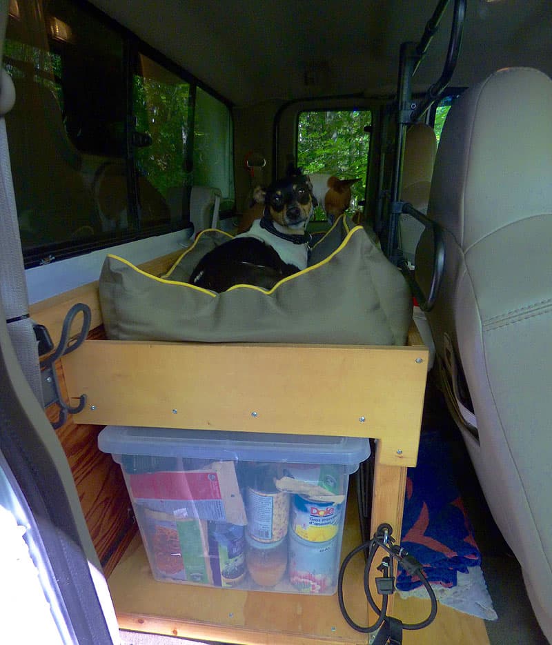 Raised platform back seat storage in truck