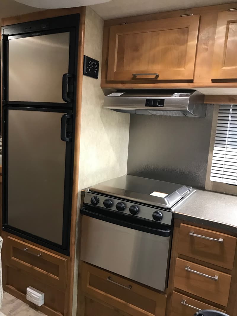 Bigfoot Camper Stainless Kitchen In Canoe Birch