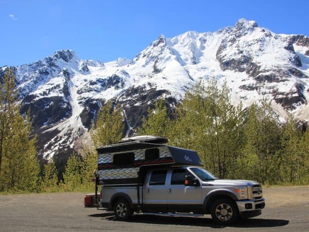 #218 - Nancy StevensonHighway 37A in British Columbia, Canada2015 Ford 35002017 Capri RetreatCamera Used - Canon ESO 60DThis shot was taken on Highway 37A in British Columbia, Canada.  It is our favorite place to be, since this road has everything we love - bears, waterfalls, glaciers, and magnificent scenery!  My husband stopped to take a picture of a mama bear and her two cubs on the other side of the road.  While he was taking many pictures of the bears, I snapped this shot of our fabulous camper.