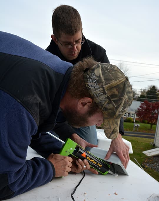 Solar-Panel-Install-junction-box-wire-caulk