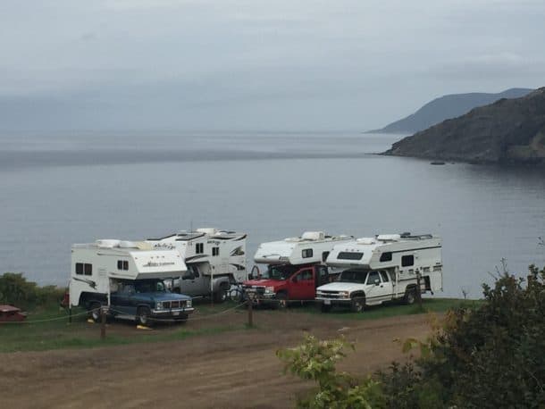 #266 - Joe ZeccaMeat Cove, Cape Bretton Island, Nova Scotia2011 Chevy Silverado 35002012 Arctic Fox 1140Camera Used - iPhoneThe photo shows four truck campers parked on the edge of the cliff, over the ocean, at Meat Cove, Cape Bretton Island, Nova Scotia.  We were all touring Nova Scotia caravan style, and this was the northernmost point of our journey.