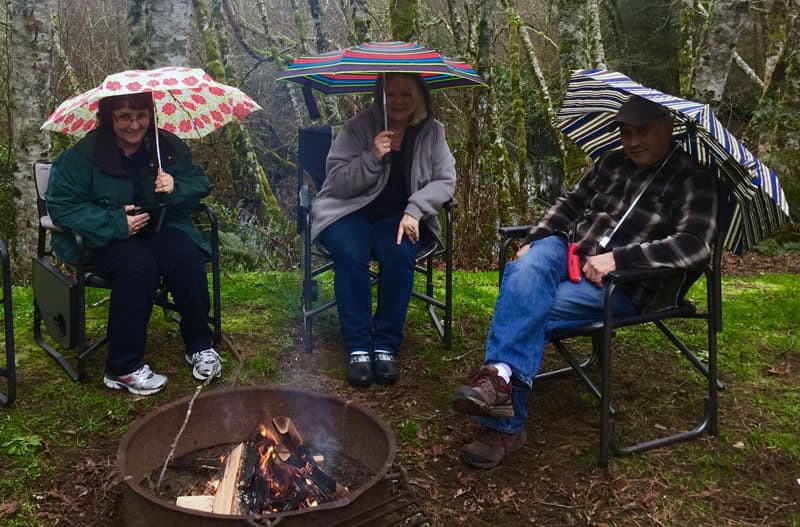 Camping In The Rain, Umbrellas and Campfire