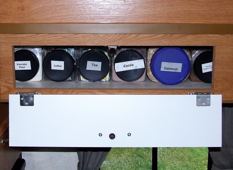 Canisters on shelf to store food items