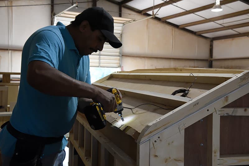 Capri Cowboy Roof Installation nose to body of camper