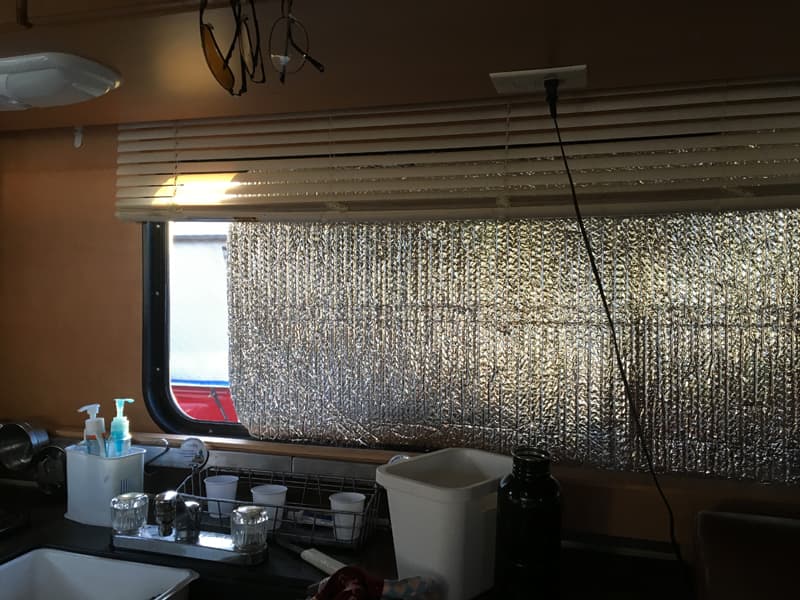 Insulation with blinds partially down