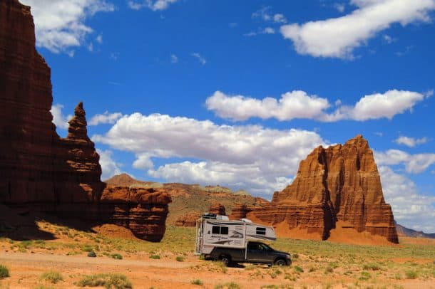 #100 - Richard FiteCathedral Valley, Capitol Reef National Park, Utah2006 Ram 35002011 Arctic Fox 990Camera Used - Samsung Galaxy S3We were camping at Capitol Reef National Park in early May and learned about a 20+ mile off-road trek into Cathedral Valley.  The road was marginal, but the scenery was spectacular.  This photo was taken at the Temple of the Moon with the Temple of the Sun in the background.
