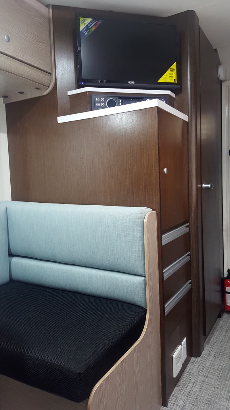 Cirrus 920 Storage behind dinette and bath