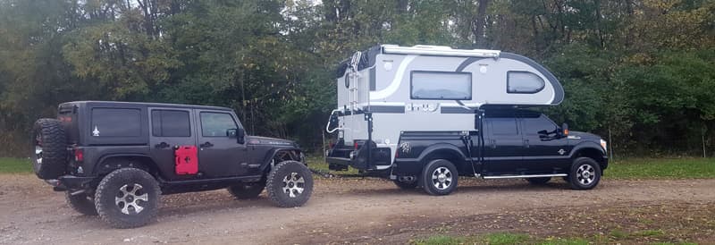 Cirrus Camper with towed Jeep