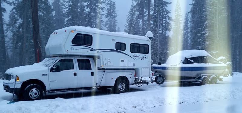 Bigfoot towing boat in winter