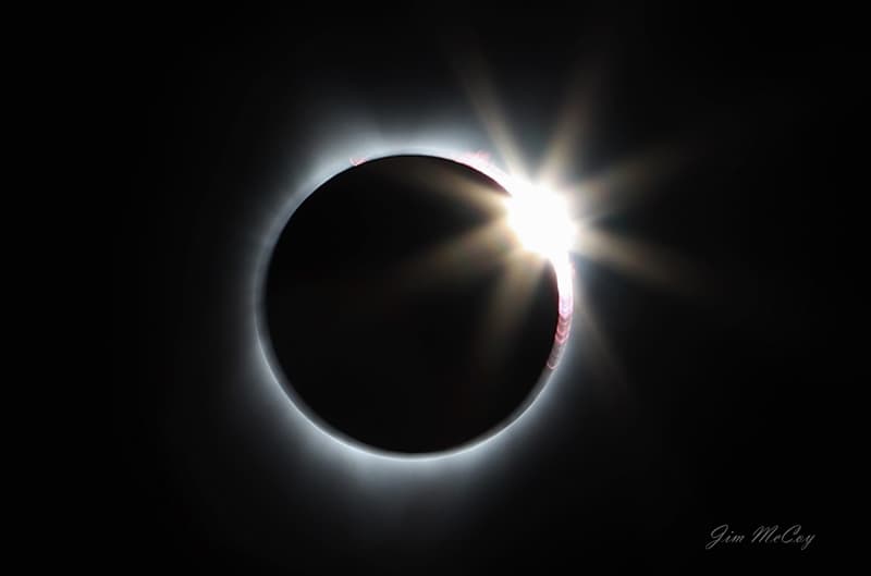 Diamond ring moon over sun