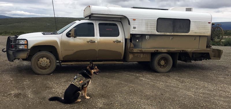 Dirty camper driving through Alaska