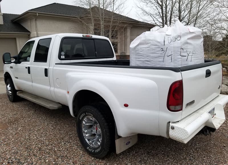 Dually Truck Hauling Mulch