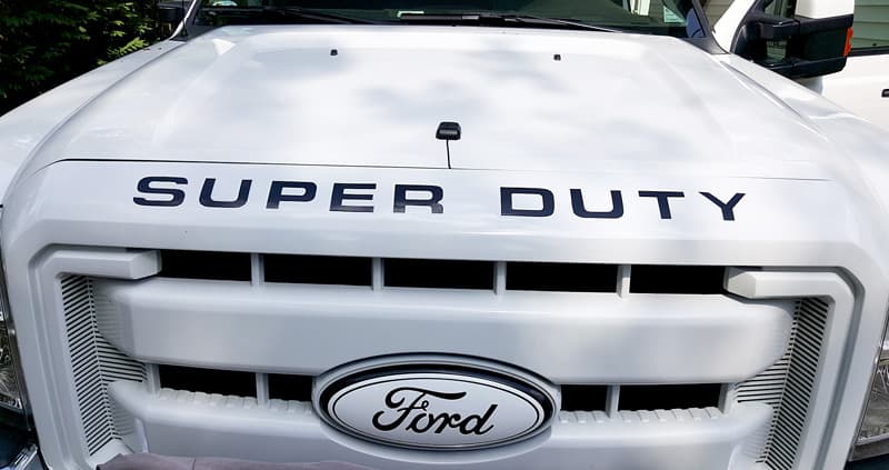 Sirius XM magnet on Ford hood