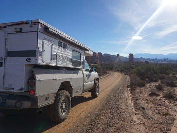#261 - K PawleyArches National Park, Utah2005 Silverado HD2016 Four Wheel Camper GrandbyCamera Used - Sony Alpha 5100In October 2016 my wife and I quit our jobs to travel the Americas.  We'd only been on the road for a week or so and were camping on BLM land outside Moab and Arches National Park.  While sitting around the fire that night, I was looking over the maps and noticed the small dirt road that passed our campsite appeared to wind its way into the National Park.Turns out BLM RD378 (Willow Springs) is one of two alternate entrances into the park.  We're always looking for excuses to avoid pavement, and this was a more direct route to boot!  The washes and slickrock ledges on the BLM portion of the road made for a fun morning and a far more dramatic entry into Arches than the main gate.
