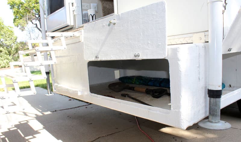 White gel coat was applied and the box was mounted the overhang of the camper.