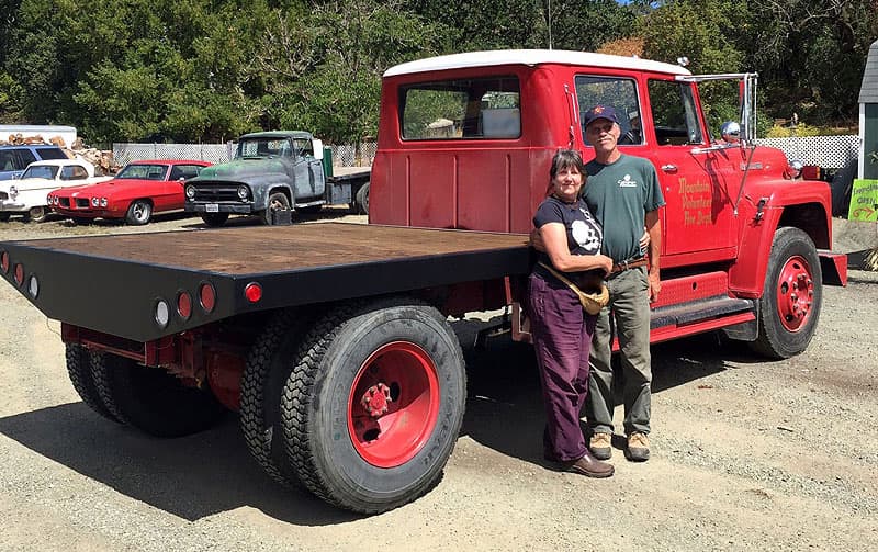 Thomas and Sequoia with their flatbed fire truck