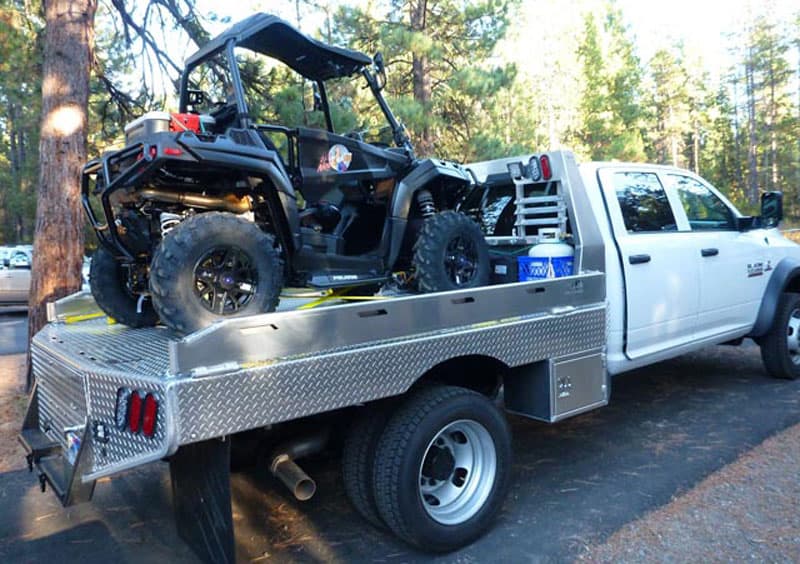 Flatbed Truck Hauling ATV