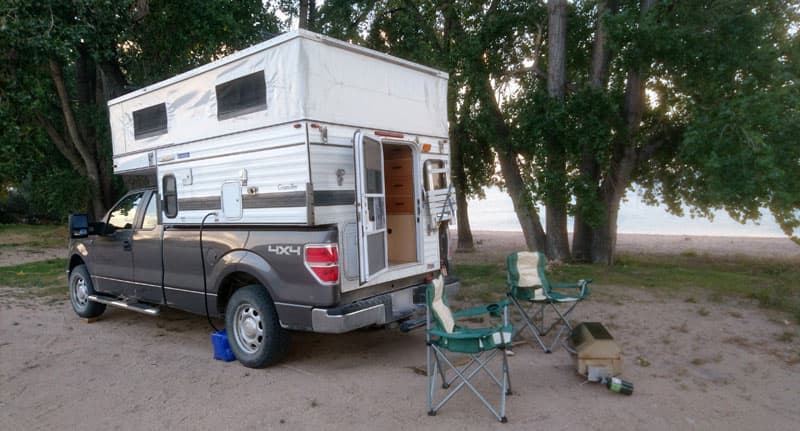 Four Wheel Camper With Camp Chairs