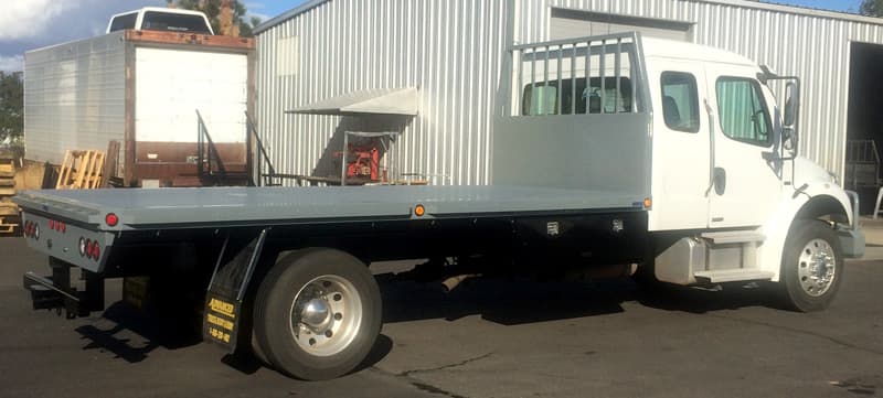 Above: Freightliner with extended flatbed