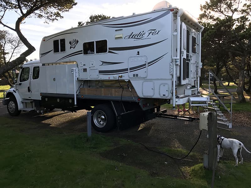 Freightliner truck camper step and handrail solution
