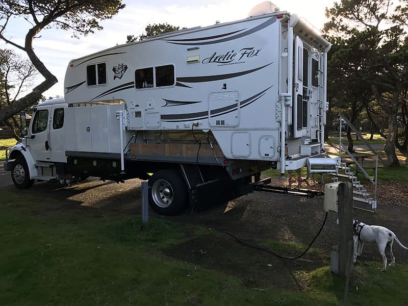 Freightliner truck camper step and handrail solution