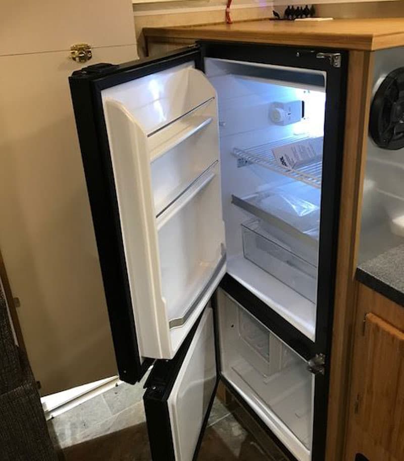 Hallmark Refrigerator In Flatbed Camper