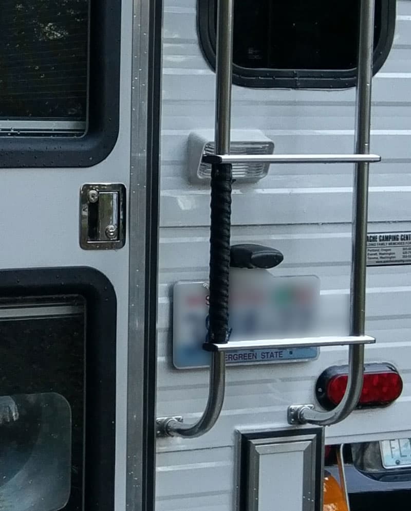 Handlebar grip on ladder