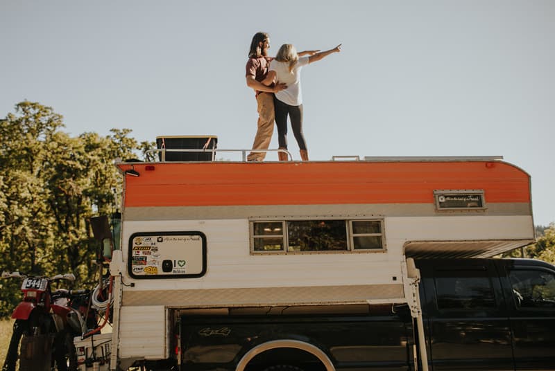 Hannah Jimmy On Roof Of Truck Camper