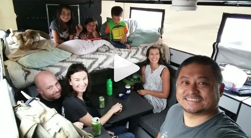 Happy Hour inside their pop-up camper